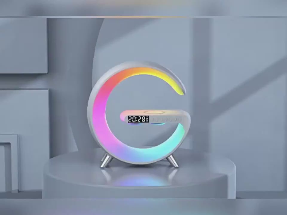 Load video: G-Shape Smart RGB bedside lamp with wireless charging, Bluetooth speaker and digital alarm clock