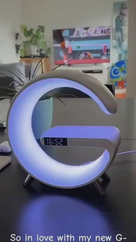 Load video: G-Shape Smart RGB bedside lamp with wireless charging, Bluetooth speaker and digital alarm clock